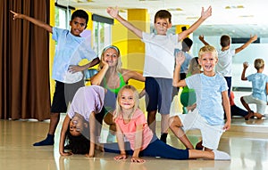Happy children in dance studio smiling and having fun