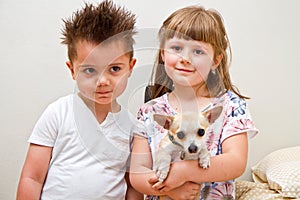 Happy children with a dog