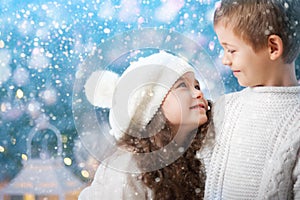 Happy children girl and boy on a winter walk