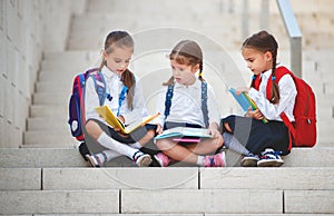 Happy children girlfriend schoolgirl student elementary school