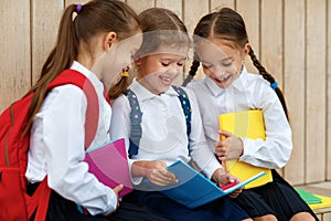 Happy children girlfriend schoolgirl student elementary school