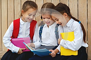 Happy children girlfriend schoolgirl student elementary school