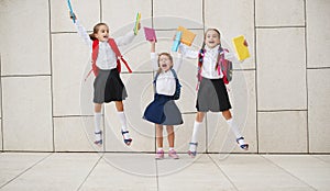 Happy children girlfriend schoolgirl student elementary school