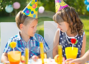 Happy children having fun at birthday party