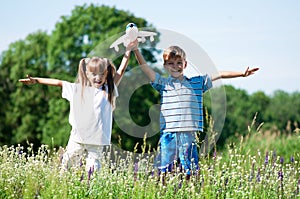 Happy children on meadow