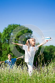 Happy children on meadow