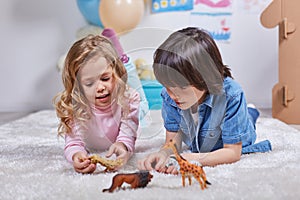 Happy children playing with enthusiasm in nersury