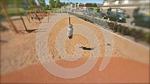 Happy children playing and having fun at playground. Cute children having fun on a play ground 