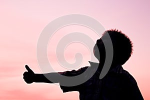 Happy children playing on nature summer silhouette