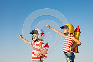 Happy children playing outdoor in summer