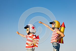 Happy children playing outdoor in summer