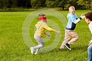 happy children playing and running at park