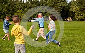 happy children playing and running at park