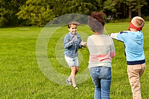 happy children playing and running at park