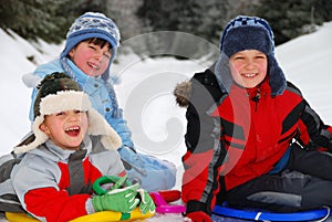 Happy children playing in snow