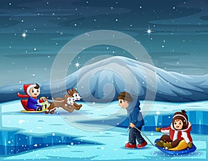 Happy children playing in winter season