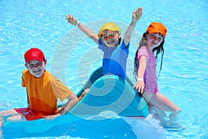 Happy children in pool