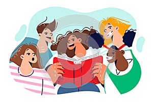 Happy children read book standing around classmate with encyclopedia and are surprised open mouths