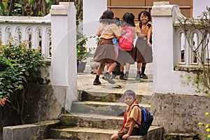 Happy children after school in Java, Indonesia