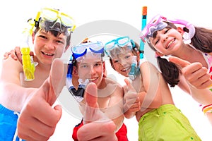 Happy children in snorkels