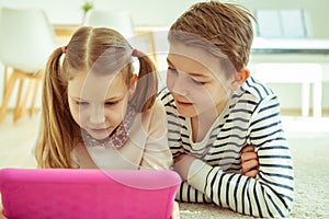 Happy children speaking and with friends using laptop during quaranrine
