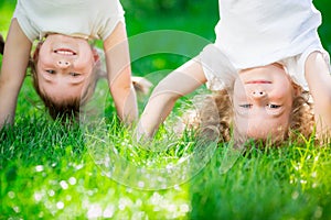 Happy children standing upside down