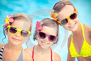 Happy children in the swimming pool