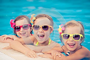 Happy children in the swimming pool