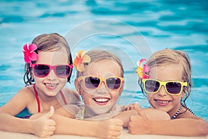 Happy children in the swimming pool