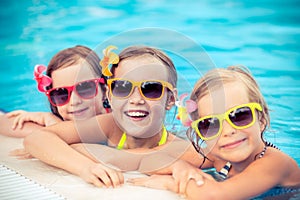 Happy children in the swimming pool