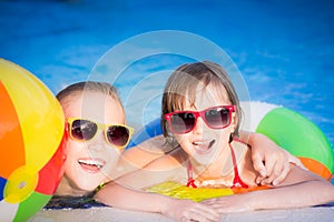 Happy children in the swimming pool