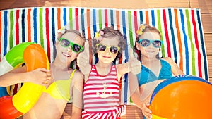 Happy children in the swimming pool