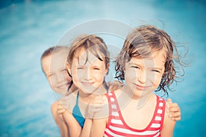 Happy children in the swimming pool