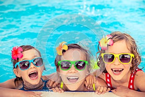 Happy children in the swimming pool