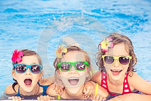 Happy children in the swimming pool