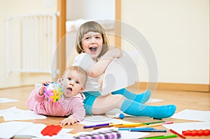 Happy children together in home