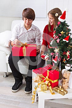 Happy children under Christmas tree