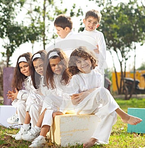 Happy children in white