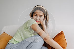 Happy and chill vibes asian woman alone in living room. Concept of love myself