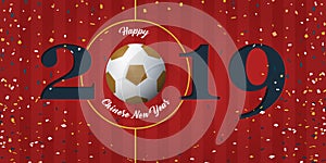 Happy Chinese New Year 2019 banner with soccer ball and paper confetti on soccer field background. Banner template design.