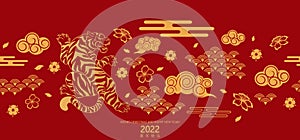 Happy Chinese new year 2022 year of The Tiger paper cut Tiger asian elements with craft style on background. Chinese is mean Happy