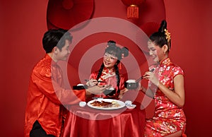 Happy Chinese new year. Asian family dinner food for prosperity celebration festival isolated on red decoration traditional