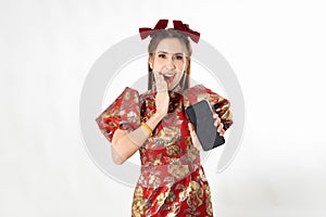 Happy chinese new year. excited young Woman showing blank smart phone screen