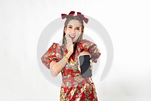 Happy chinese new year. excited young Woman showing blank smart phone screen