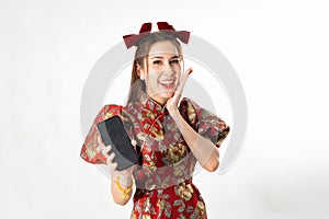 Happy chinese new year. excited young Woman showing blank smart phone screen