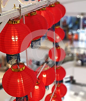Happy Chinese new year red lanterns for decorative place. High hanging light group