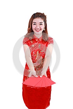 Happy chinese new year. smiling asian woman holding red envelope