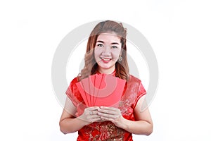 Happy chinese new year. smiling asian woman holding red envelope