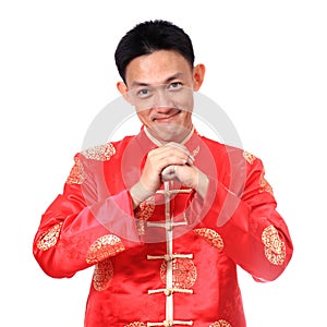 Happy Chinese new year.Young Asian man with gesture of congratulation on white background.