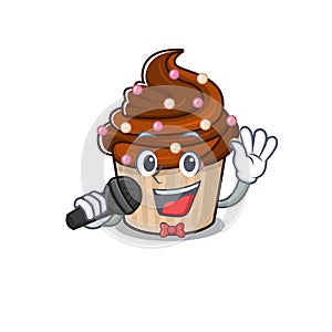 Happy chocolate cupcake singing on a microphone